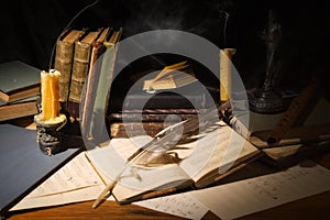 Old books and candles on wooden table