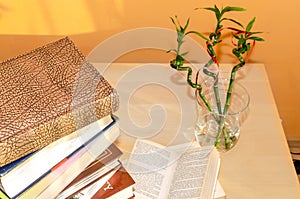 Old books piled up on a table