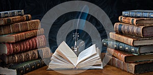 Old books ,quill pen and vintage inkwell on wooden desk in old library. Ancient books historical background. Retro style. photo