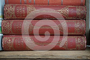Old books Shakespeare red staple