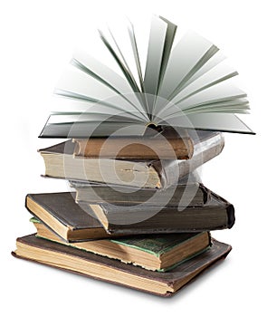 old books stacked one on top of another on a white background