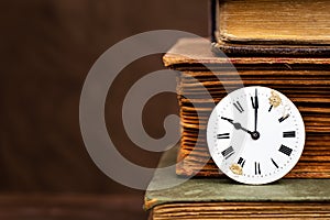 Old books and vintage clock face, story time, storytelling background