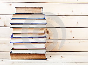 Old books on a wooden shelf. funds for education