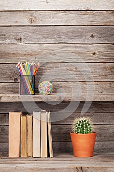 Old books on a wooden shelf