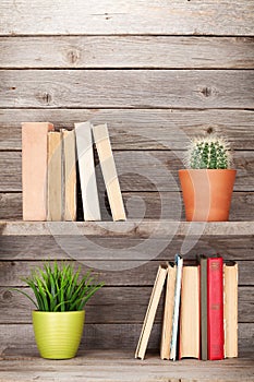 Old books on a wooden shelf