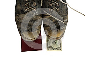 Old boots with legs and money