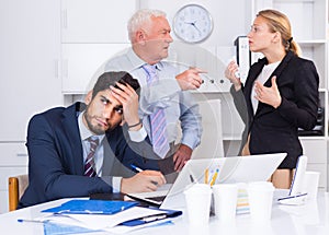 Old boss is chastising employees because of uncompleted work