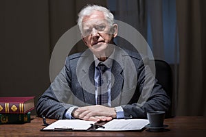 Old boss working overtime