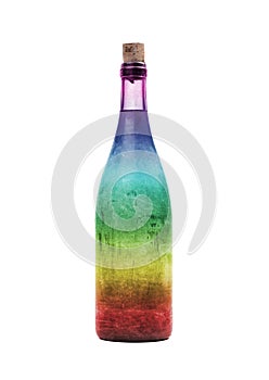 Old bottle of wine in a rainbow colored bottle, covered in dust