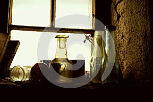 Old Bottles On Windowsill photo