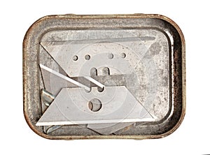Old box with spare sharp knife blades