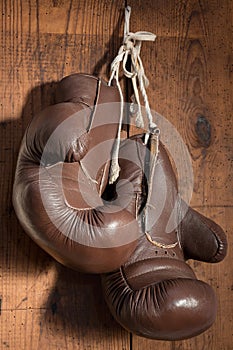 Old Boxing Gloves, hanging on wooden wall