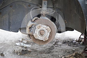 Old brake disc useless with rusty without tire.