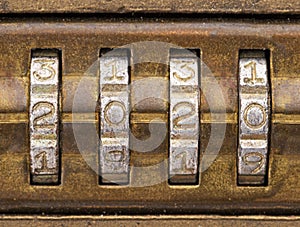 2020 on an old brass combination lock photo