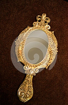 Old brass hand-mirror