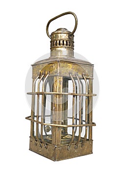 Old brass oil lantern isolated.