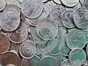 Old Brazilian coins background, selective focus. photo