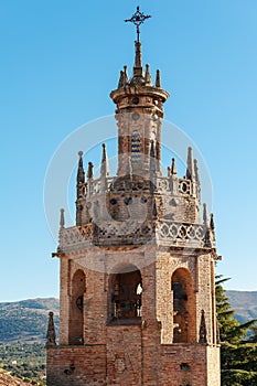 Old brick bell tower in Ronda town, Andalusia, Spain