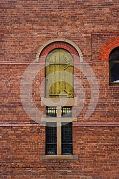 Old brick building with high loading door