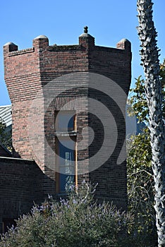 An Old Brick Building with Ornate Windows