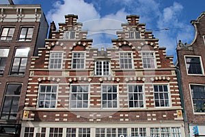 old brick buildings at nieuwmarkt in amsterdam (the netherlands)