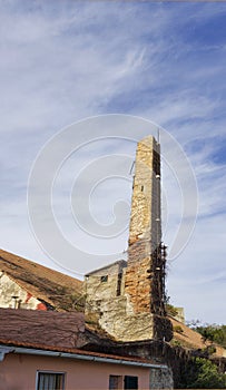 Old brick chimney on the roof