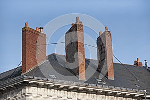 Old brick chimneys in France. Old brick chimneys in France