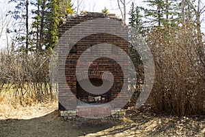 Old Brick Fireplace Remains in the Woods From an Old Ranch House