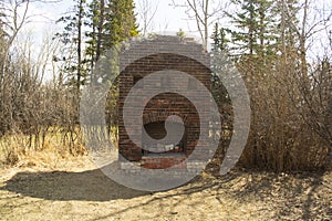 Old Brick Fireplace Remains in the Woods From an Old Ranch House