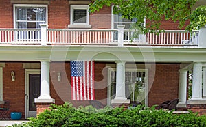 Old brick house with American flag