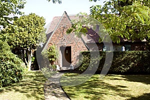 Old brick house and front yard