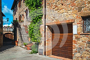 Old brick houses and beautiful street view in Tuscany, Italy