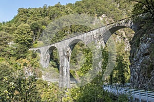 Old brick railway bridge in the Centovalli in Switzerland