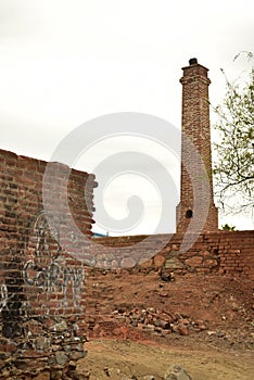 Ruins of old brick sugar mill in Todos Santos, Baja, Mexico photo