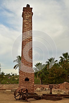 Ruins of old brick sugar mill in Todos Santos, Baja, Mexico photo