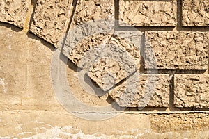 Old brick wall background with copy space. wall from squared bricks