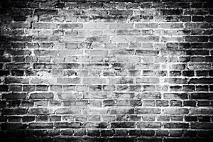 Old brick wall background. Grunge texture. Black wallpaper. Dark