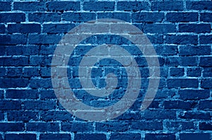 Old brick wall background texture with blue effect