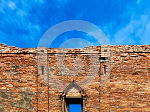 Old brick wall and blue sky