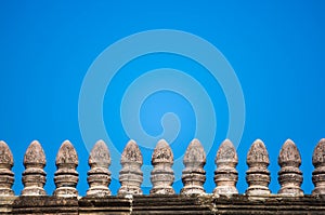 Old brick wall with blue sky