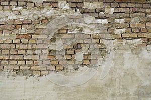 Old brick wall. Brickwork from an old brick in a rustic style. The structure and pattern of the destroyed stone wall