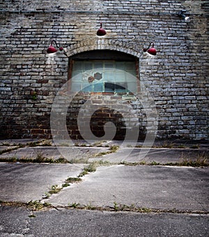 Old brick wall with glass block window