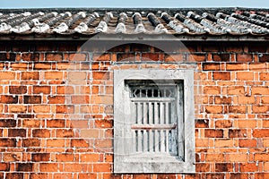 Old Brick Wall with Grey Window