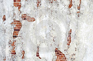 Old brick wall with peeling mortar grunge concrete weathered wall background