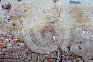 Old brick wall and ruined plaster with spider webs and dust texture background