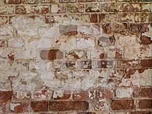 Old brick wall. Shabby surface of ancient masonry.