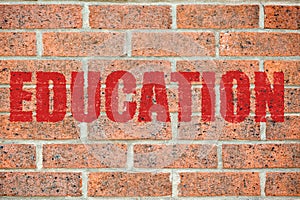 Old brick wall texture with EDUCATION inscription