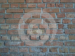 Old brick wall texture of red bricks