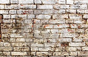 Old brick wall with white paint background texture close up , industrial detail