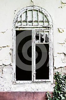 Old brick wall with window